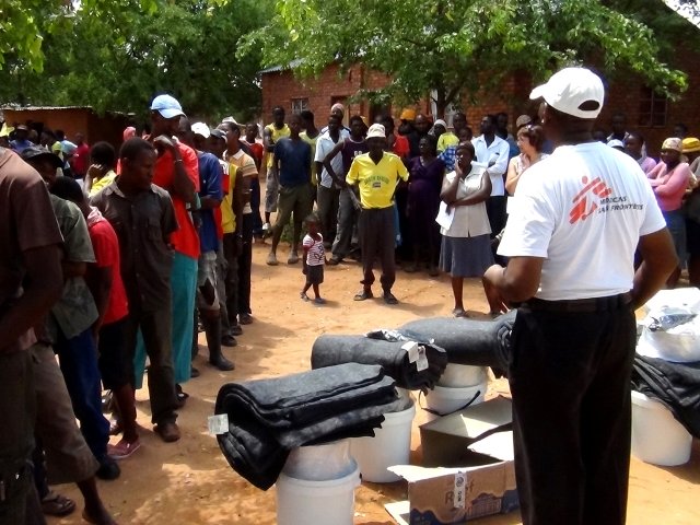 MSF teams donated non-food items such as buckets, hygiene article and blankets to farm workers, who’ s mud huts had been destroyed by the recent floods. Kayemayema, Musina, South Africa.