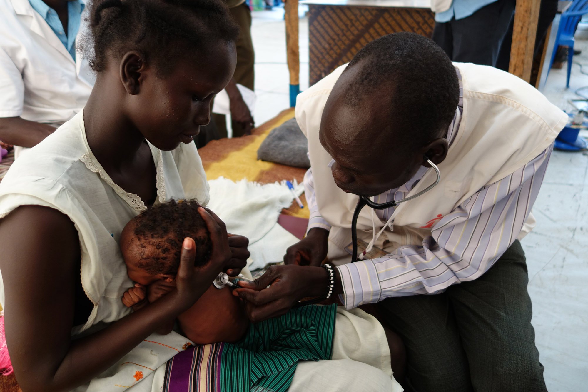 Three-month-old Mary James is being treated medical staff in the Malakal Protection of Civilians Camp in South Sudan. For the first two months of her life, Mary slept in a crowded tent with no blanket on a steel bedframe with no mattress. Photo: Jacob Kuehn
