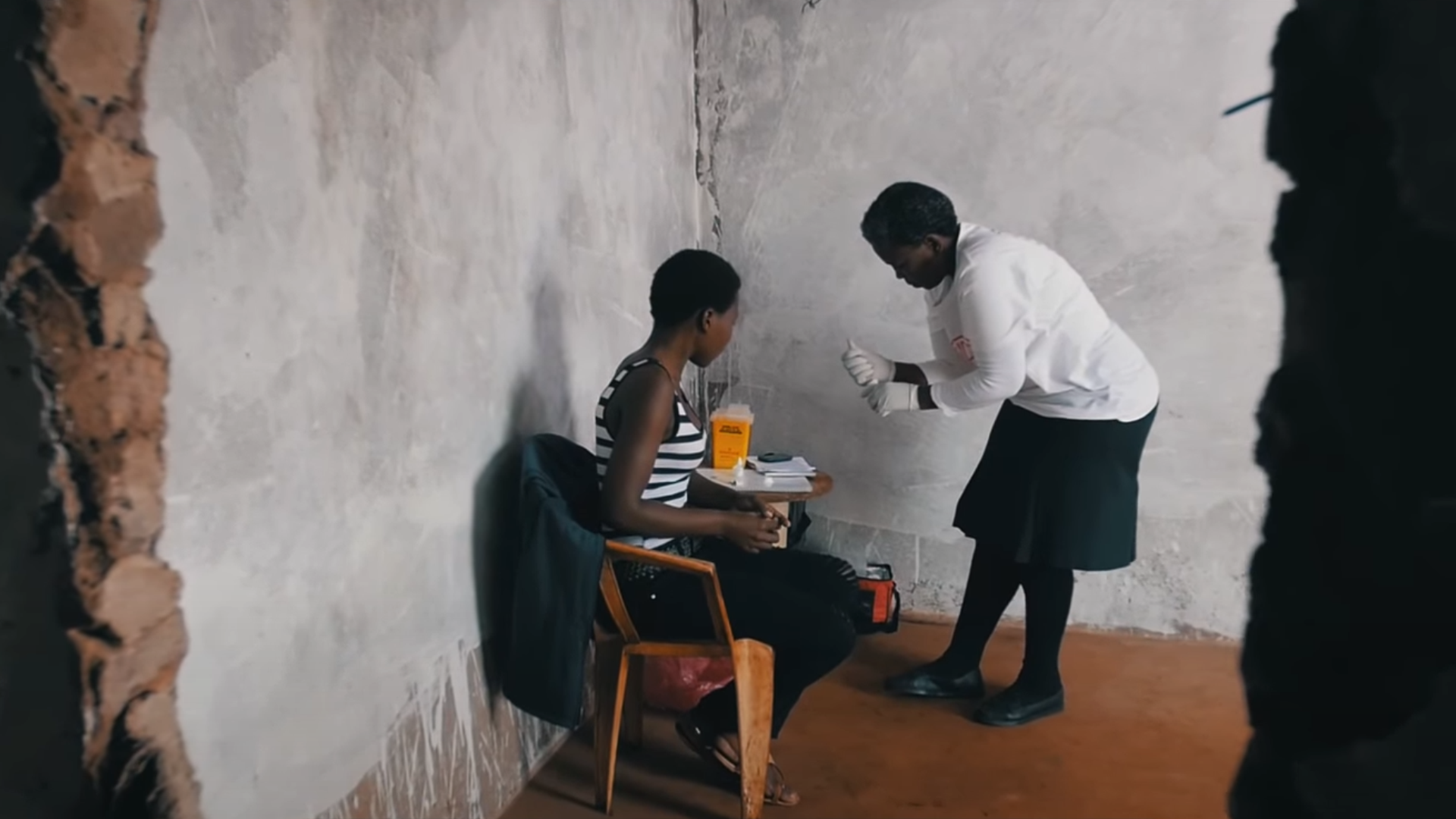 MSF Community Health Agent taking HIV test.