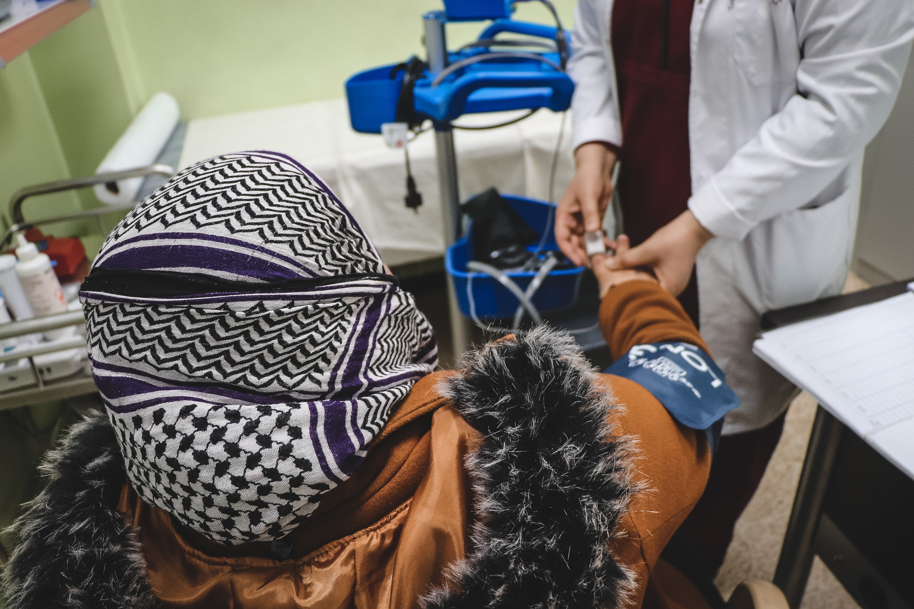 Tarfa is 40 years old and lives in Al Nahrawan neighborhood, very close to MSF’s Al Amal Maternity. She came for a consultation because she would like to check whether she is pregnant. A midwife is checking her blood pressure.