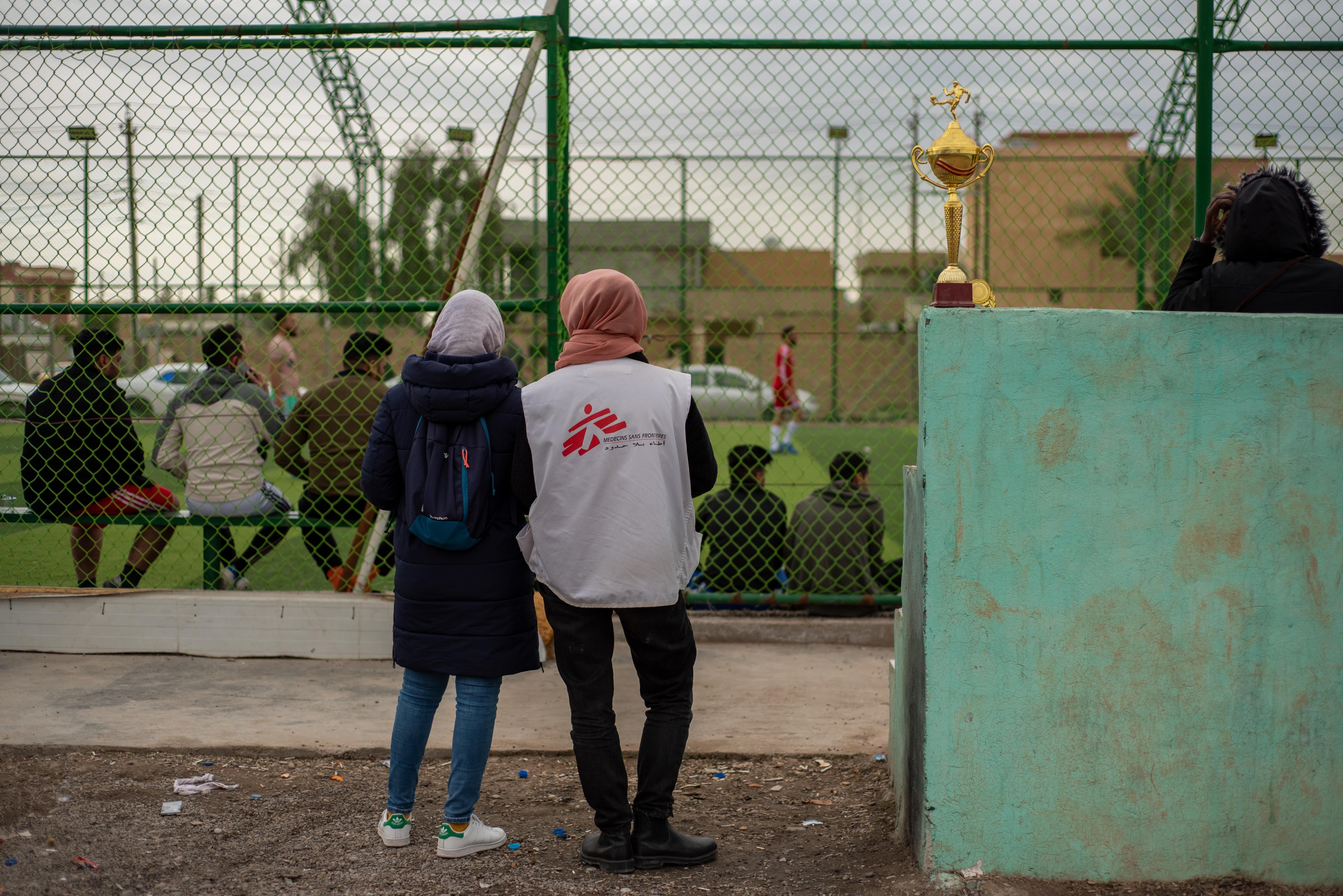 Medical Care in Iraq: MSF Worker watching soccer in Hawija