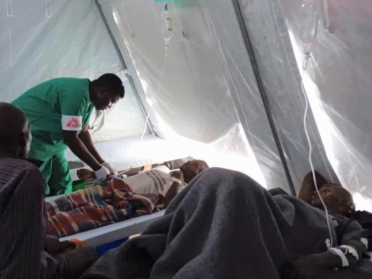 MSF staff treat patient at the Cholera treatment center
