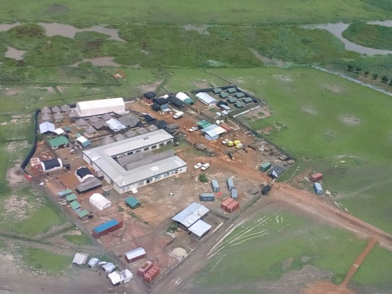 The hospital compound in Mayom with a few tukuls (or mud huts) behind it