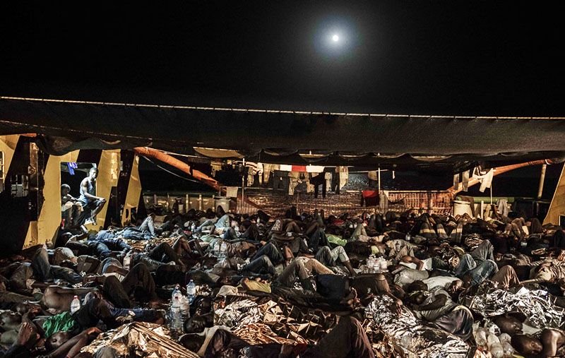 533 people sleep on the deck of the Borbon Argos after being rescued at sea by MSF in the Mediterranean.