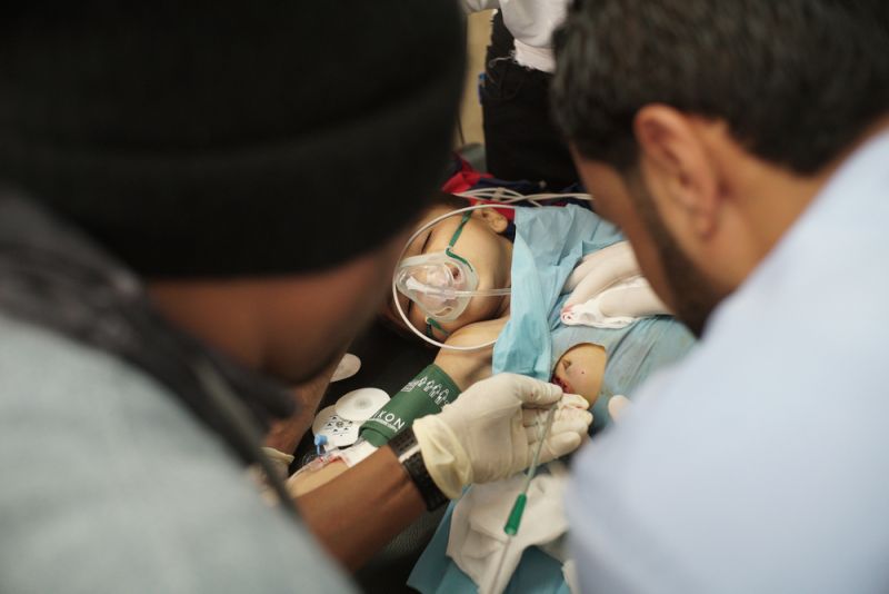 A young Syrian boy was hit by an astray bullet while being home