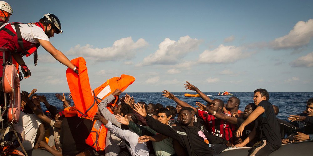 Rescuing-a-rubber-boat-taking-on-water-in-the-mediterranean-sea