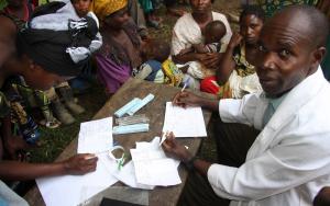 Mobile clinic by motorbike around Pinga in North Kivu province Democratic Republic of Congo 2012