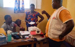 A picture of a medical consultation ongoing in the MSF-supported Bondeko Health Center of Ndu,