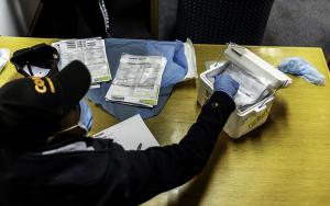Swabs used for COVID-19 tests are packed into a cold chain box during a mass screening and testing event carried out with assistance from MSF contact tracers in Johannesburg, South Africa. 