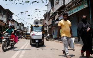 An Auto-Rikshaw (tuktuk) visiting alley lanes of Mumbai’s M-East Ward slums to generate COVID-19 Awareness