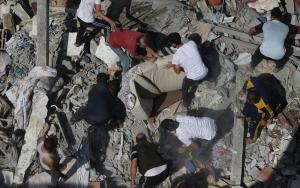 Residents search for survivors in the destruction caused by airstrikes in Gaza.