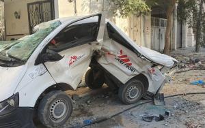The wreck of an MSF vehicle that was abandoned after an MSF convoy was attacked in Gaza in 2023. Attacks on medical care workers are devastating.