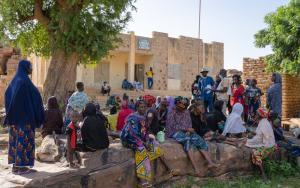 Having fled, these displaced people await their turn for a free consultation with MSF. In these consultations, the health workers give them advice on mental health, using illustrated materials. Picture taken in the Bandiagara Circle, central Mali.