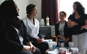 Cultural mediator Sanna Basyouny is explaing MSF mental health activities to three women from Syria and Iraq living in Lundsbrunn asylum centre in Götene, Sweden. 