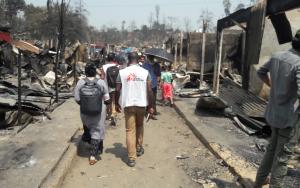 A picture of MSF assessment team outside the burnt camp in Cox's Bazaar in Bangladesh