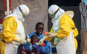 Jariatu, an MSF &#039;care-giver&#039; looking after a 9mo baby