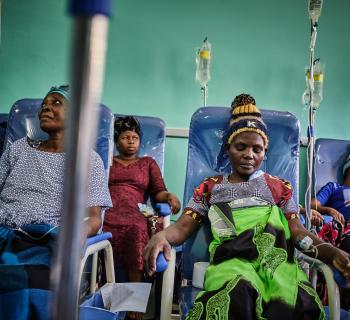 Aliyanesa Nkunye during a chemotherapy session at Queen's Elizabeth Central Hospital. "Before I started treatment I was in a lot of pain and couldn't eat or sleep at night. Since I have started I feel much better," she says.