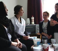Cultural mediator Sanna Basyouny is explaing MSF mental health activities to three women from Syria and Iraq living in Lundsbrunn asylum centre in Götene, Sweden. 