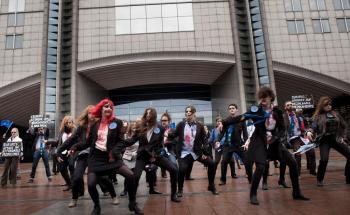 Activists from across Europe stage flashmob in front of the European Parliament