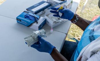A fieldworker prepares HIV test kit which forms part of MSF's response to the COVID-19 pandemic. Vulnerable populations can be screened for COVID-19 and other diseases like HIV and Diabetes. 