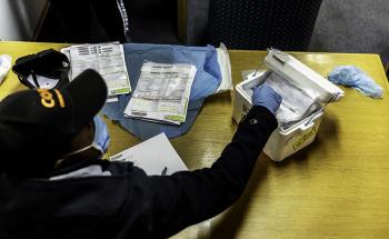 Swabs used for COVID-19 tests are packed into a cold chain box during a mass screening and testing event carried out with assistance from MSF contact tracers in Johannesburg, South Africa. 