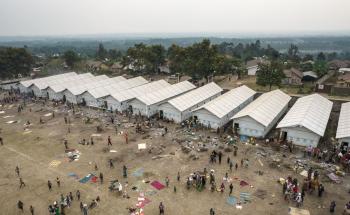 This aerial photograph shows the informal site of conflict-displaced people settled in the Rutshuru Centre stadium, in North Kivu province, eastern Democratic Republic of Congo.