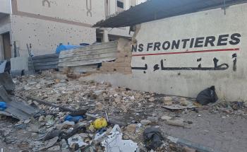Image of a damaged wall in the MSF office in Gaza due to Israeli bombings.