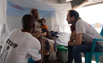 Dr Christos visiting the MSF hospital in Chad where Sudan refugees who fled violence are receiving medical aid. 
