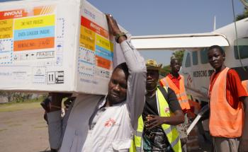 MSF staff offload hepatitis E vaccination tools in South Sudan