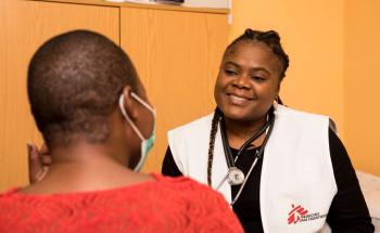 MSF staff consulting a patient in Michael Mapongwane Communiyu Health Centre