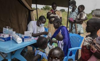A member of MSF staff does a rapid malaria test before children receive the SMC drugs at a seasonal malaria chemoprevention distribution site in the village of Kuom, South Sudan, October 27th, 2021.