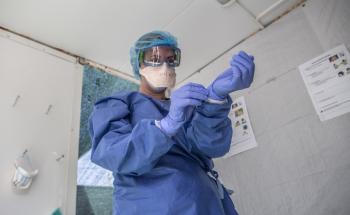 Health worker in full PPE