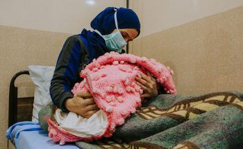 A displaced woman who gave birth to her fourth child at a hospital co-managed by MSF, the main hospital providing C-sections in the area.