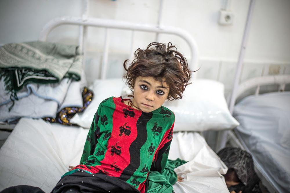 A young girl waits in the observation room of the female emergency room in Boost hospital, Lashkar Gah, Helmand, Afghanistan