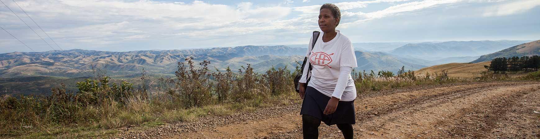 Community Health Agent Babongile Luhlongwane on her way to deliver HIV Counseling and Testing services to inhabitants of the Entumeni Umlalazi Municipality under Uthungulu District in rural KwaZulu-Natal.