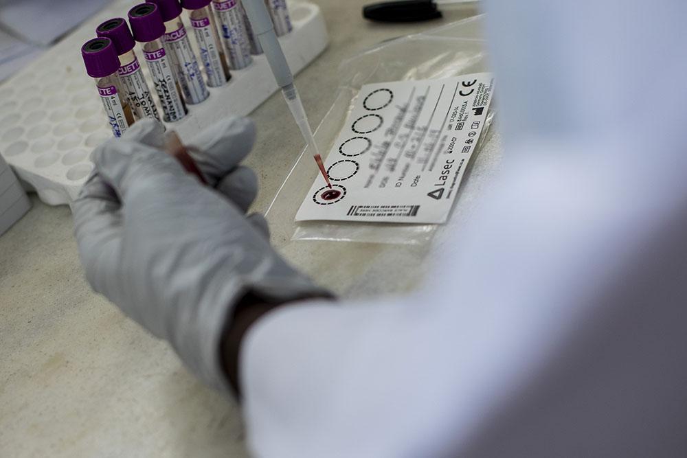 José Manuel, MSF lab technician, conducts tests to check patient's viral load during the first days after the 09 April resumption of the HIV-related activities in the MSF-supported Munhava health centre in Beira after Cyclone Idai hit the city. 