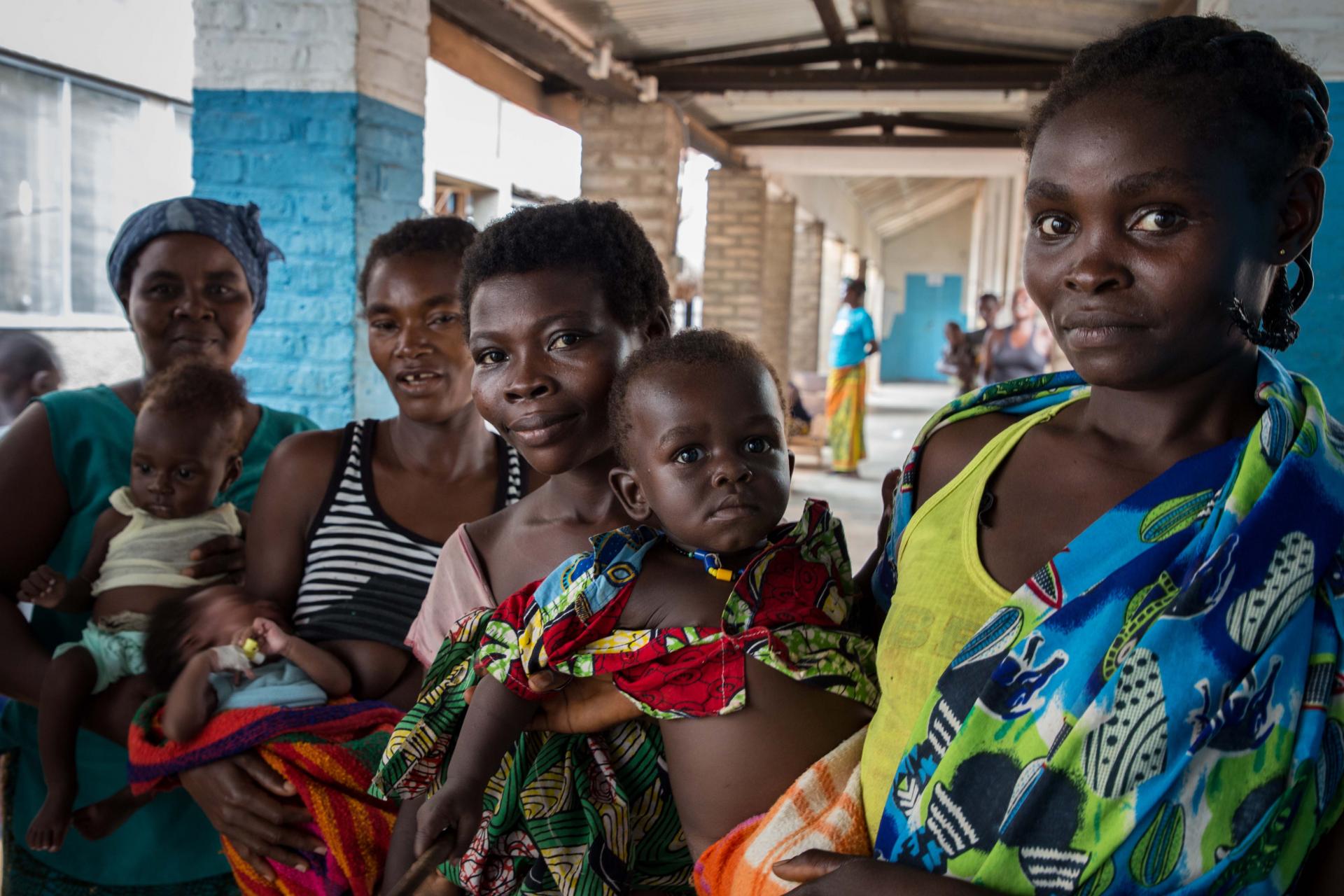 Four mothers posing in a corridor of the Hospital in Bili, DRC 2018
