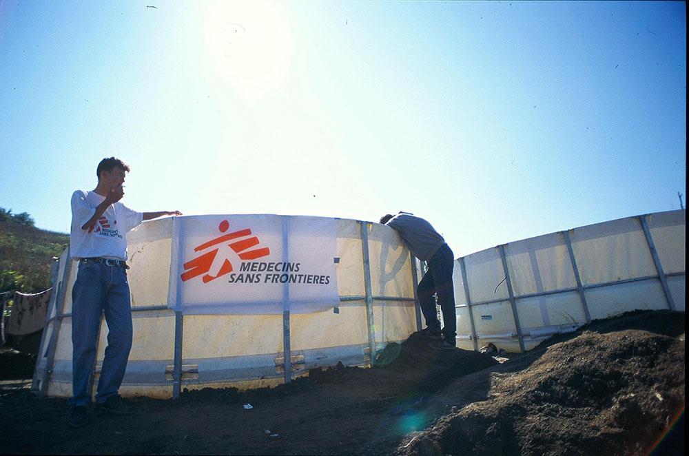 About 22,000 people live here in an improvised camp near Vojnic. Trapped between Croatian checkpoints, they are living along the road in the worst conditions. MSF is running a health post together with the ICRC. MSF's water supply for the people living here. 
