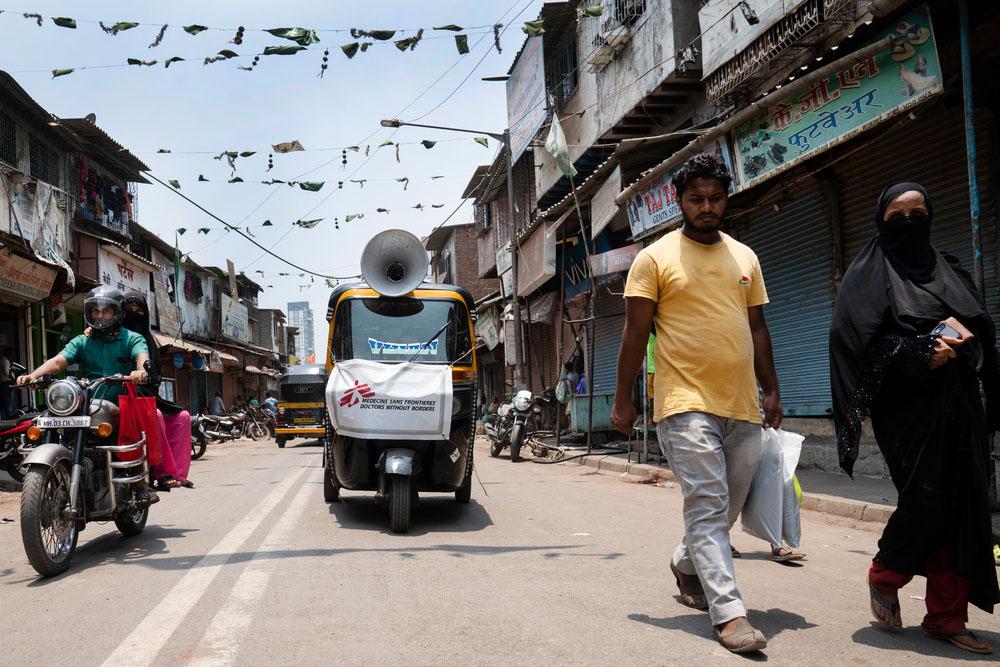 An Auto-Rikshaw (tuktuk) visiting alley lanes of Mumbai’s M-East Ward slums to generate COVID-19 Awareness