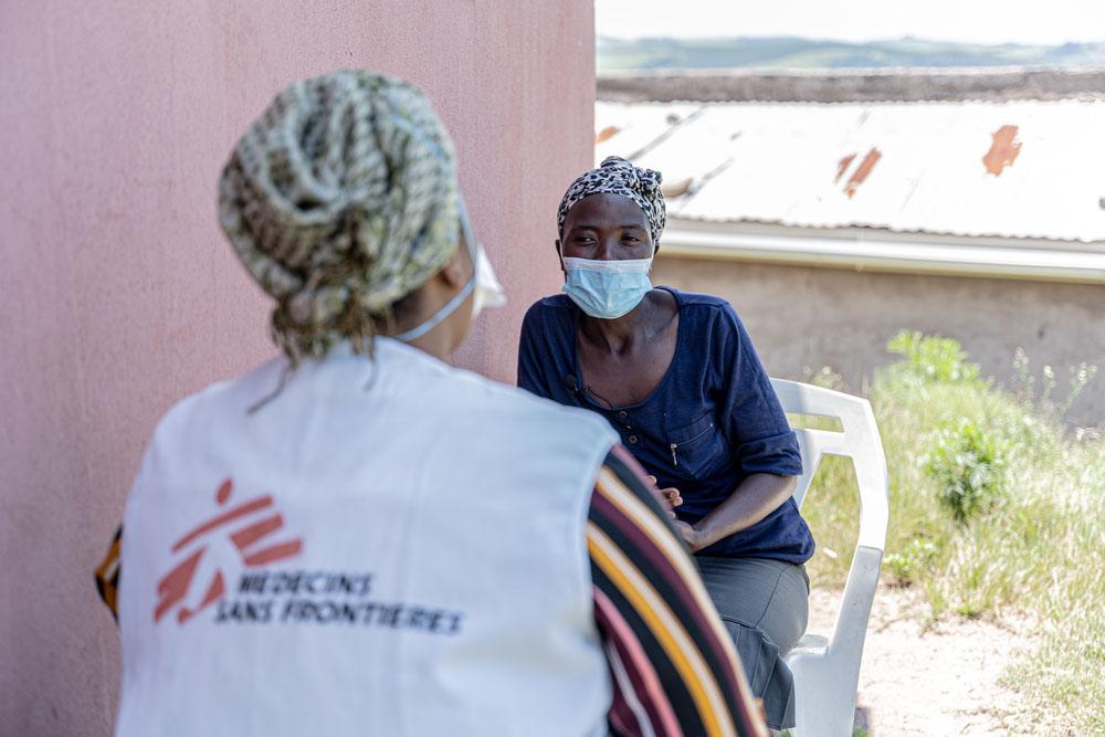 MSF fieldworker speaking with a DR-TB patient