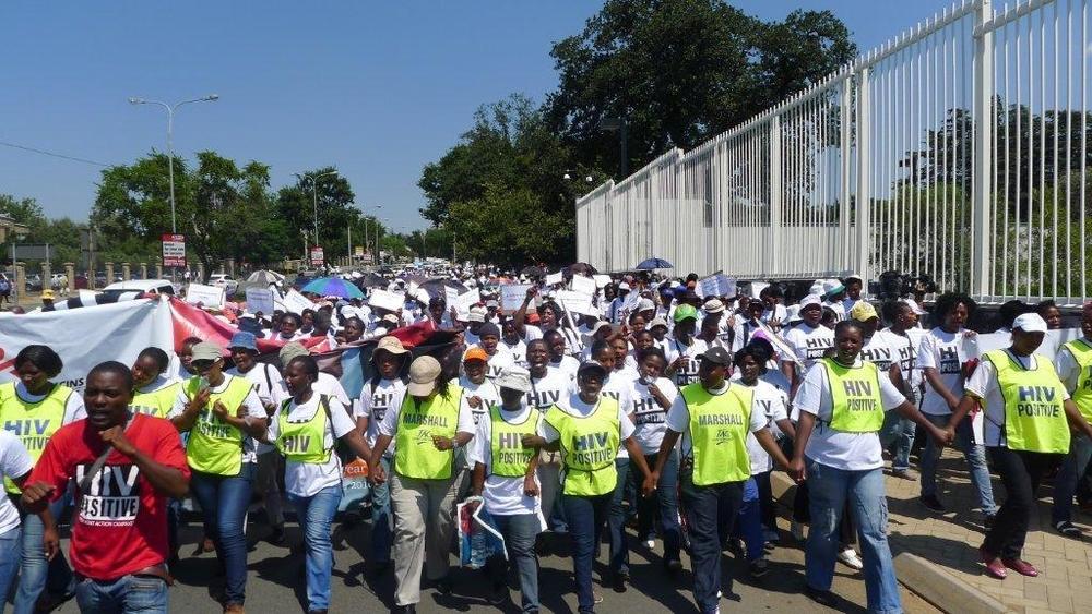 Health activists marching for the Global Fund Financing Crisis