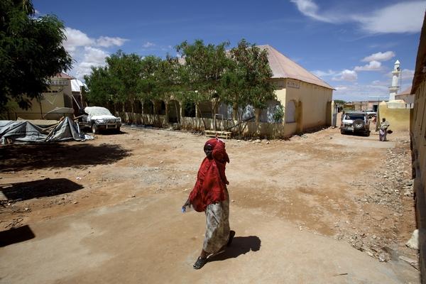 A patient walking from an MSF clinic