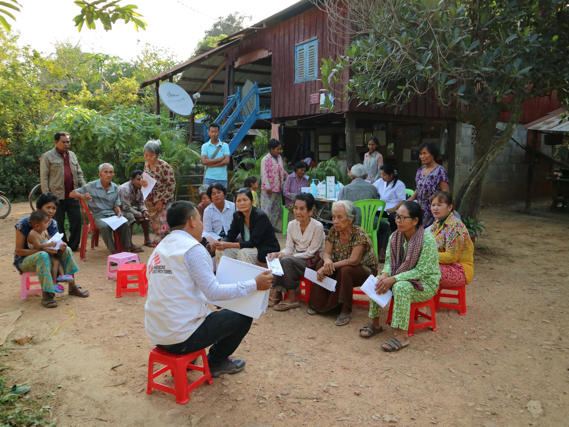 MSF staff carrying out information and education activities in Cambodia