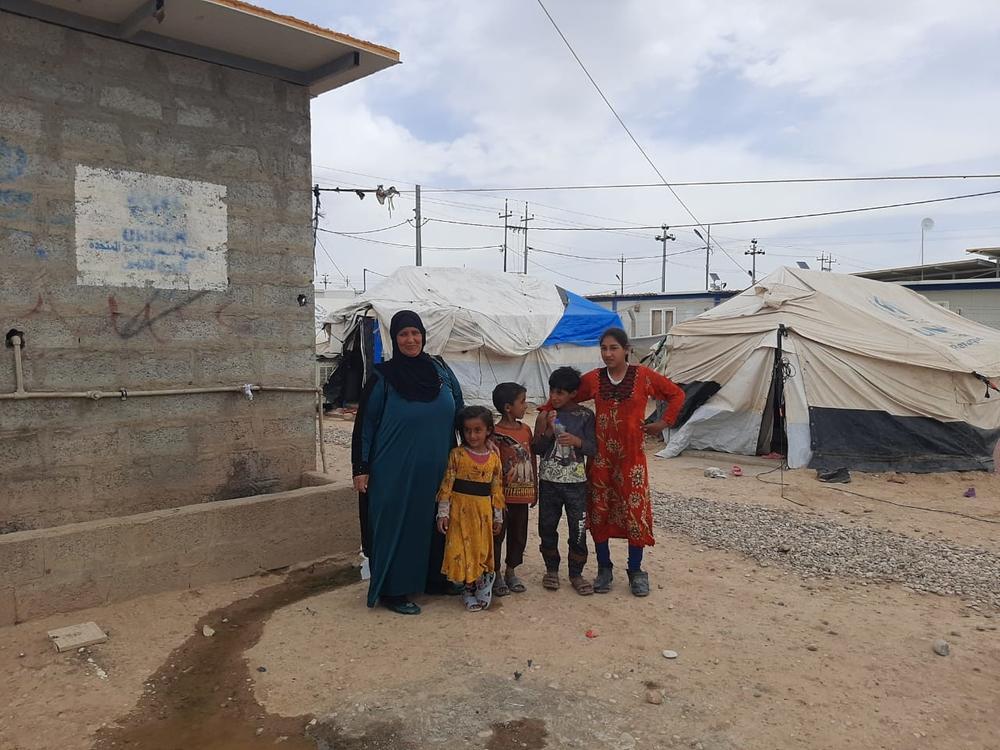 A family that lives in Laylan camp in Iran