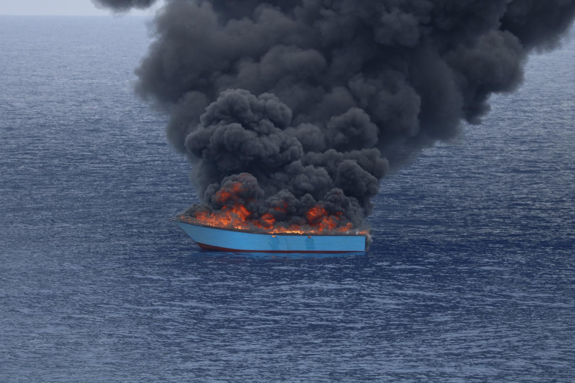 MSF_Search and Rescue_ Central Mediterranean Sea crisis - Migrant boat set on fire