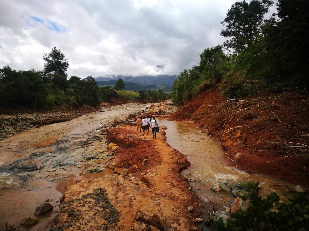 Our MSF team walking on foot to access a village cut off by damage caused by Cylone idai in Chimanimani.
