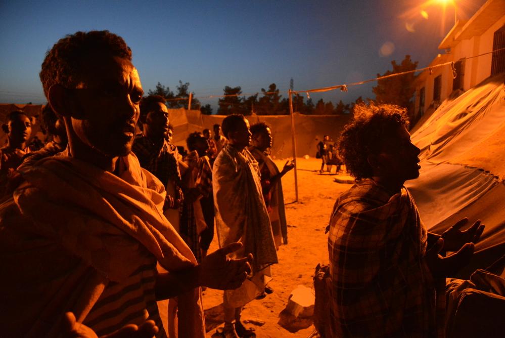 Sunday mass for Christian Eritrean refugees in Zintan DC in a makeshift church they built.