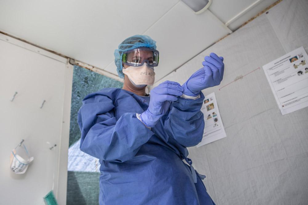 Health worker in full PPE 