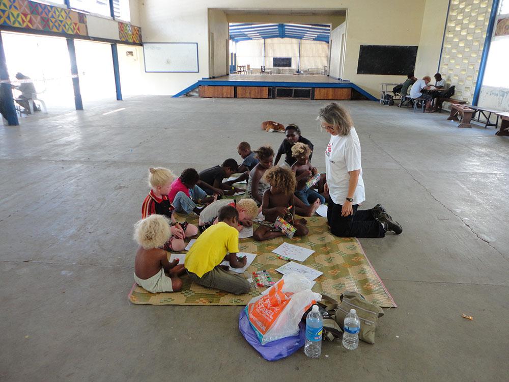 MSF psychologist Cynthia Scott runs mental health activities with children in the temporary evacuation shelters in Honiara, capital of the Solomon Islands, after devastating flash floods in early April displaced people from their homes. 