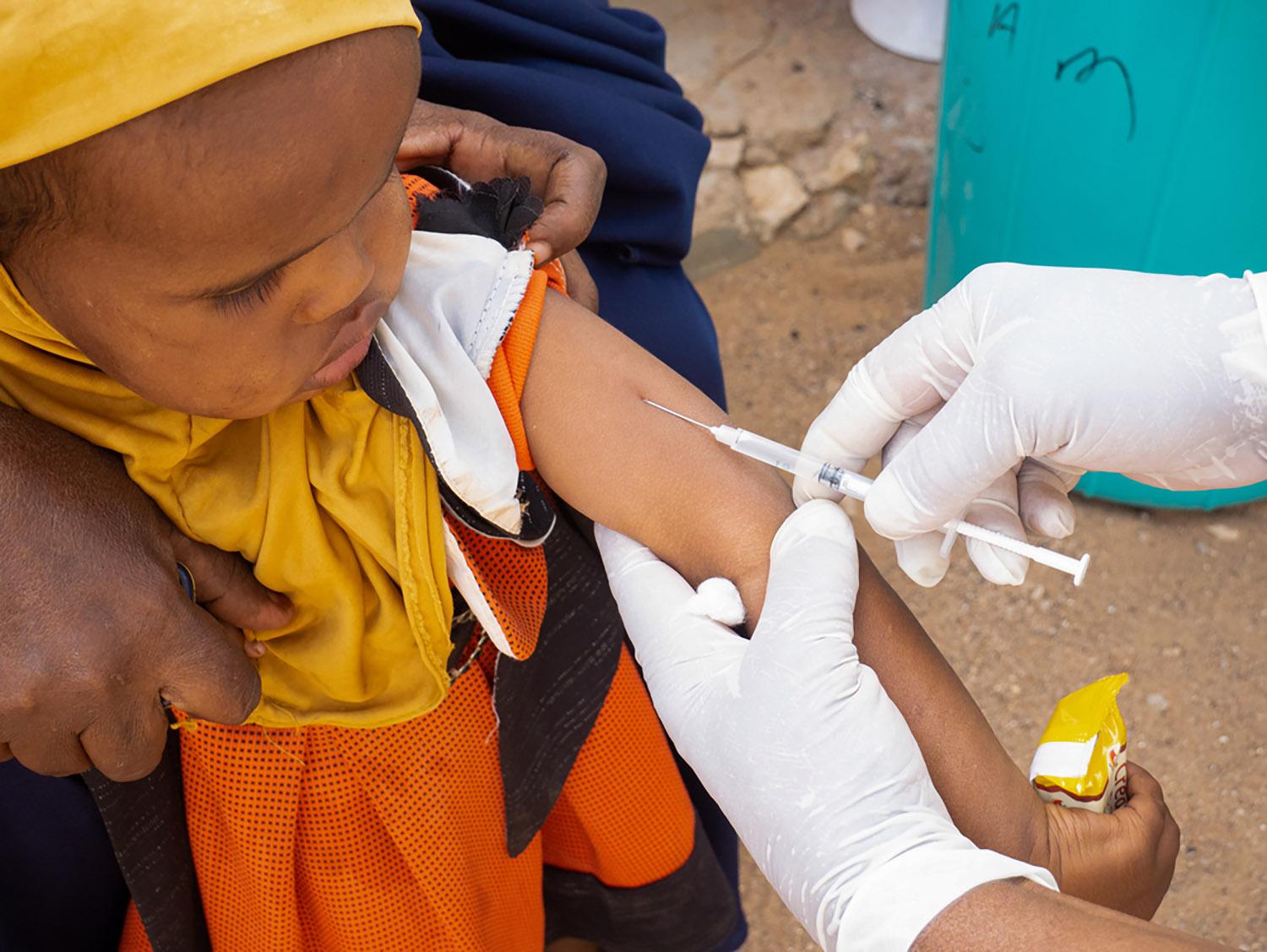 A young girl receiving measles vaccine in odweyne district, Somaliland.